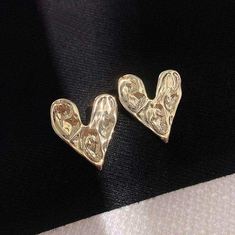 High-grade Simple Uneven Love Heart Stud Earrings | MODE BY OH